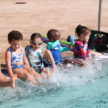 Children enjoying water safety classes at the Tampa Y.