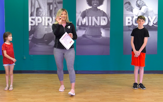 ymca instructor with kids for fun exercise game