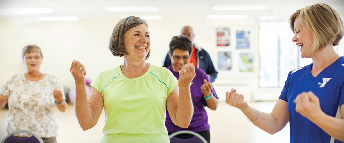 Active Older Adults in a chair exercise class at the YMCA.