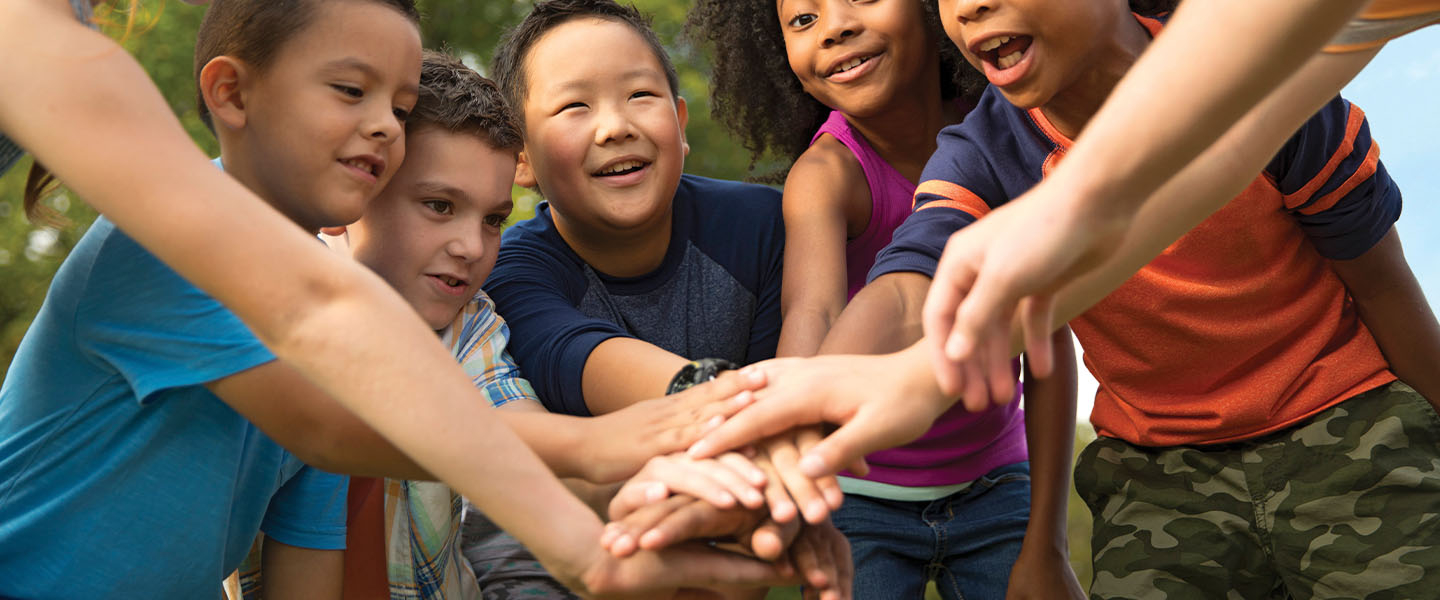 Huddle up at Tampa Y Summer Camp!