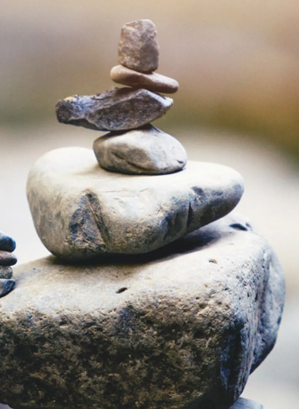 close up image of stacked stones with background out of focus