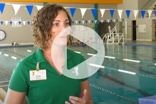 woman speaking in front of pool
