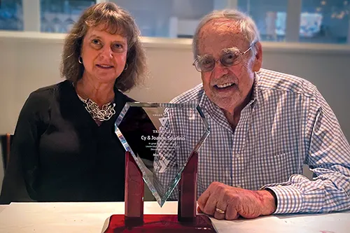 Joanne and Cy Spurlino with 2021 Red Triangle Award