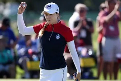 Pro golfer celebrates her victory at a tournament.