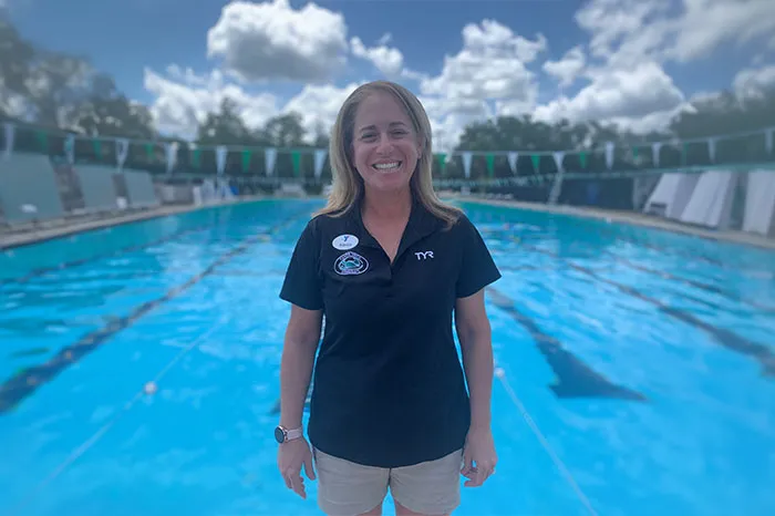 Alexi Mendenhall in front of pool.
