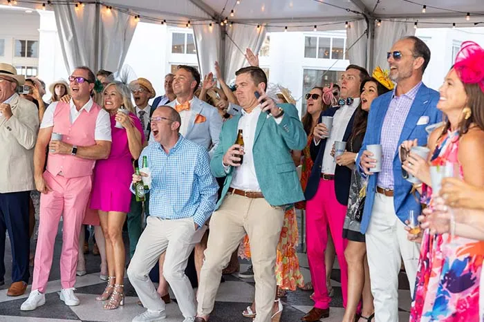 Guests cheer on the horses for the 150th Kentucky Derby!