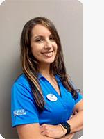 headshot of female personal trainer wearing blue YMCA polo
