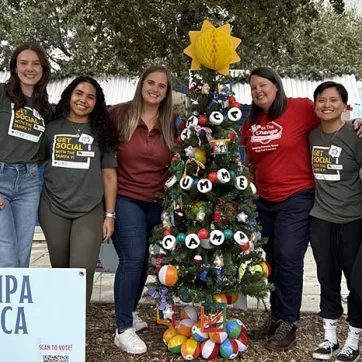 Tree decorating team at Curtis Hixon Park.