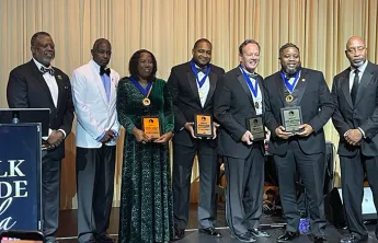 Tampa Y congratulates Keith Whitehead (second from right) on being honored!