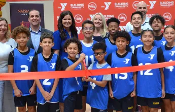 Youth at North Brandon YMCA gymnasium ribbon cutting.
