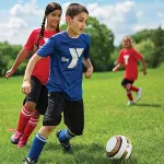 Kids playing soccer at the Y.
